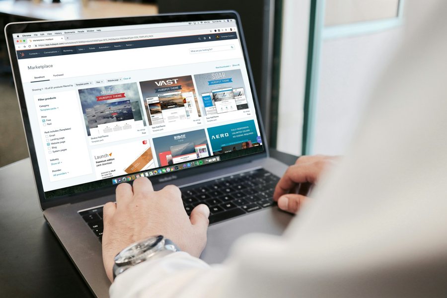 Person browsing a website on a laptop